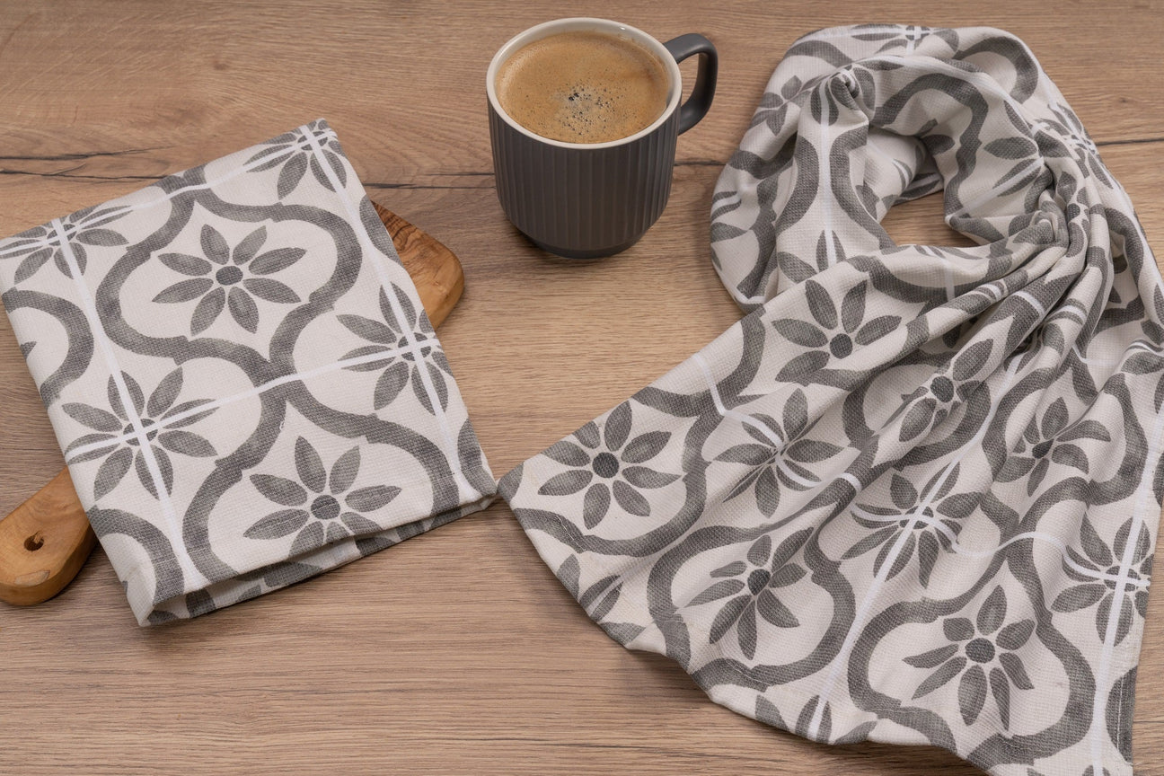 Cotton tea towel with a grey pattern